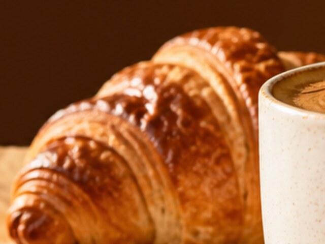 Golden butter croissant on baking paper